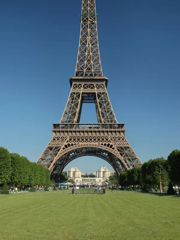 The Eiffel Tower rising over the Champ de Mars in Paris