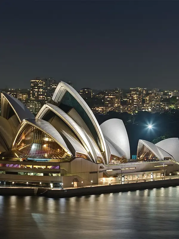 The Sydney Opera House on the harbour at night